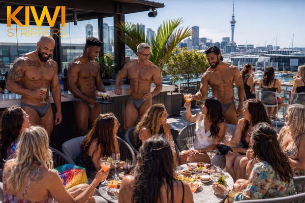 Four topless g-string waiters as Sky Tower rooftop hens VIP squad serving a bridal group in Auckland